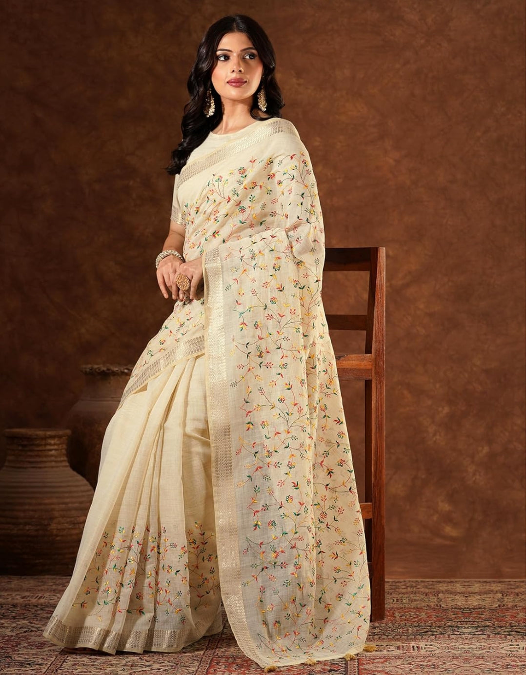 Kanaklata Festive Off-White Linen Blend Saree with Floral Resham Embroidery, Zari Woven Border & Running Blouse