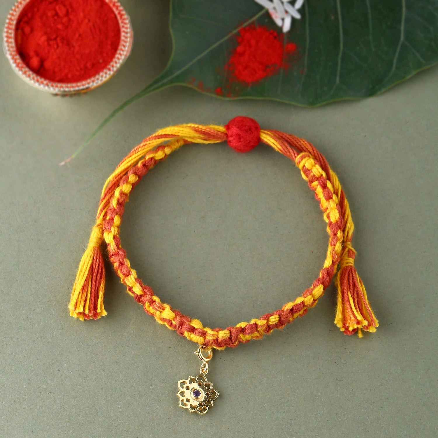 Sahasrara Chakra Rakhi With Gemstone - Gold