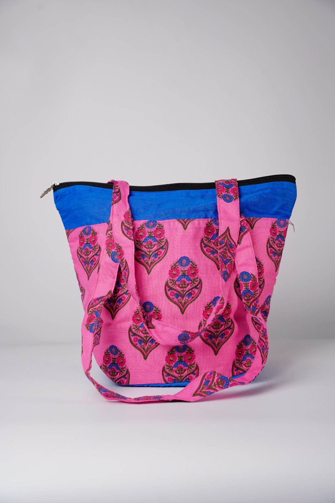 cotton quilted tote bag with a floral block print design