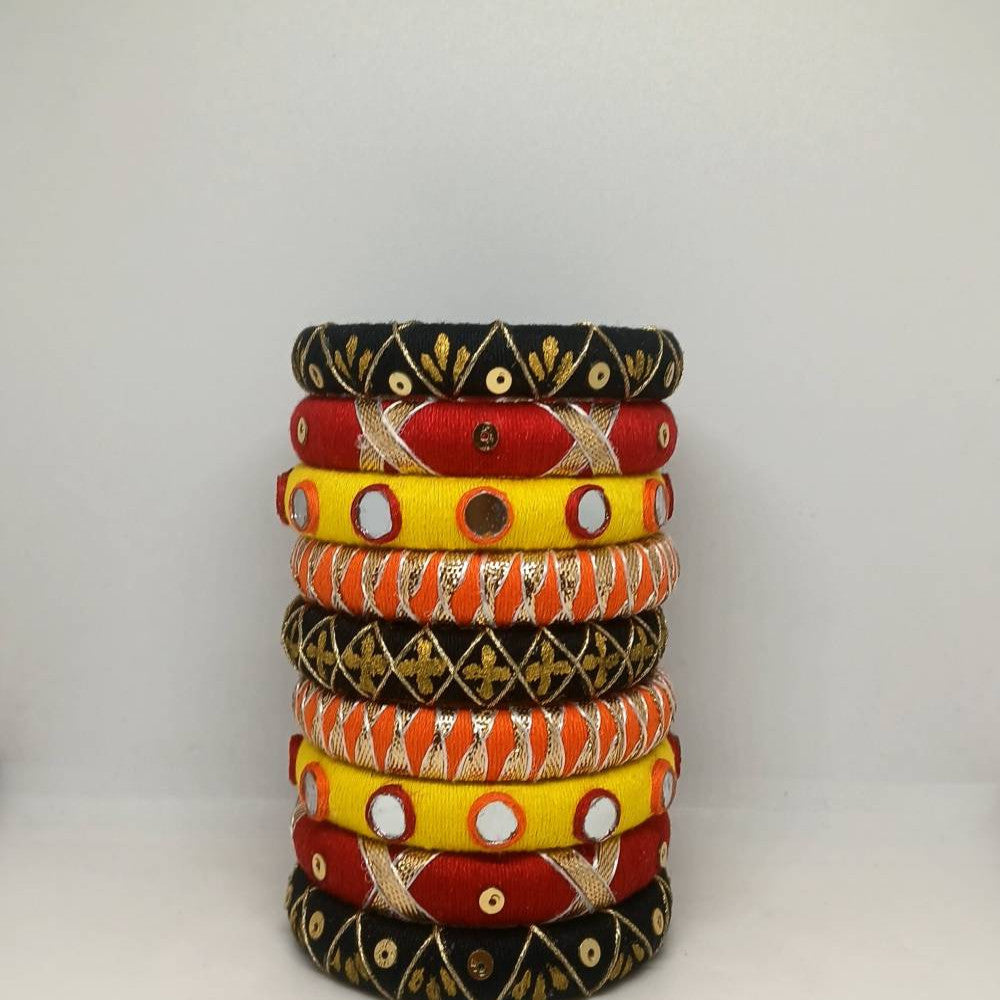 Mandira [Black yellow and red colour handcrafted bangles]