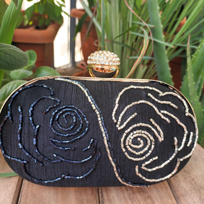Black bead embroidered clutch