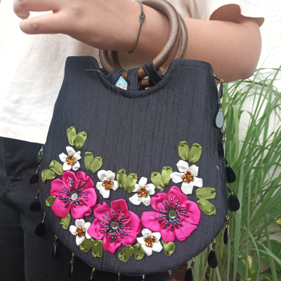 Black hand embroidered colorful flower handbag