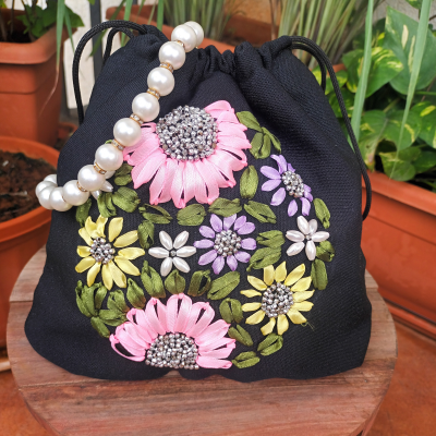 Black hand embroidered colorful flower potli