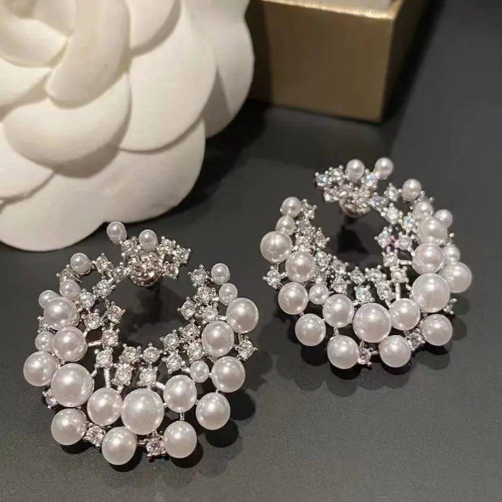 Pearl and diamond earrings