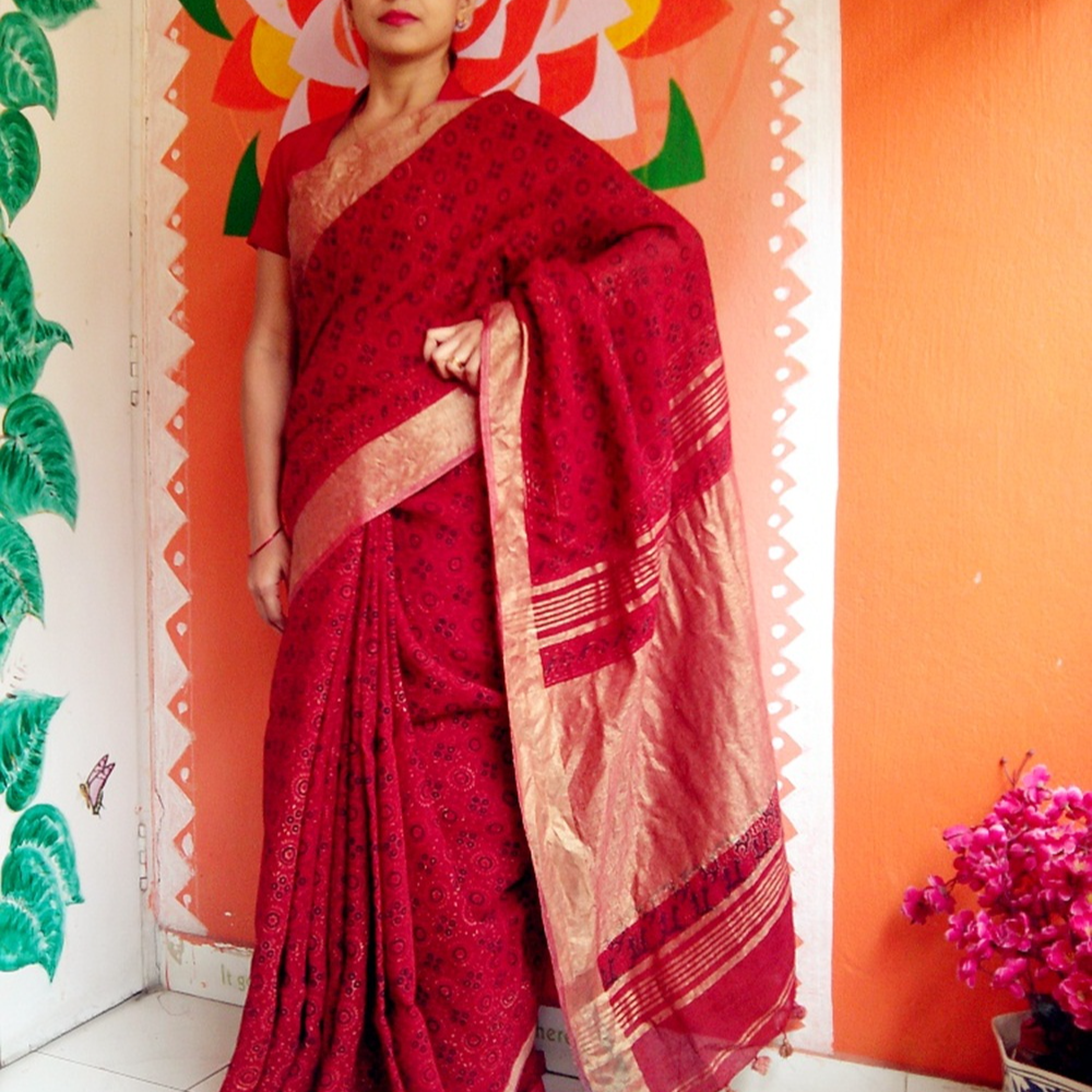 Pure Linen Saree with Ajrakh Hand Block Print..Zari Border Signature Work Saree