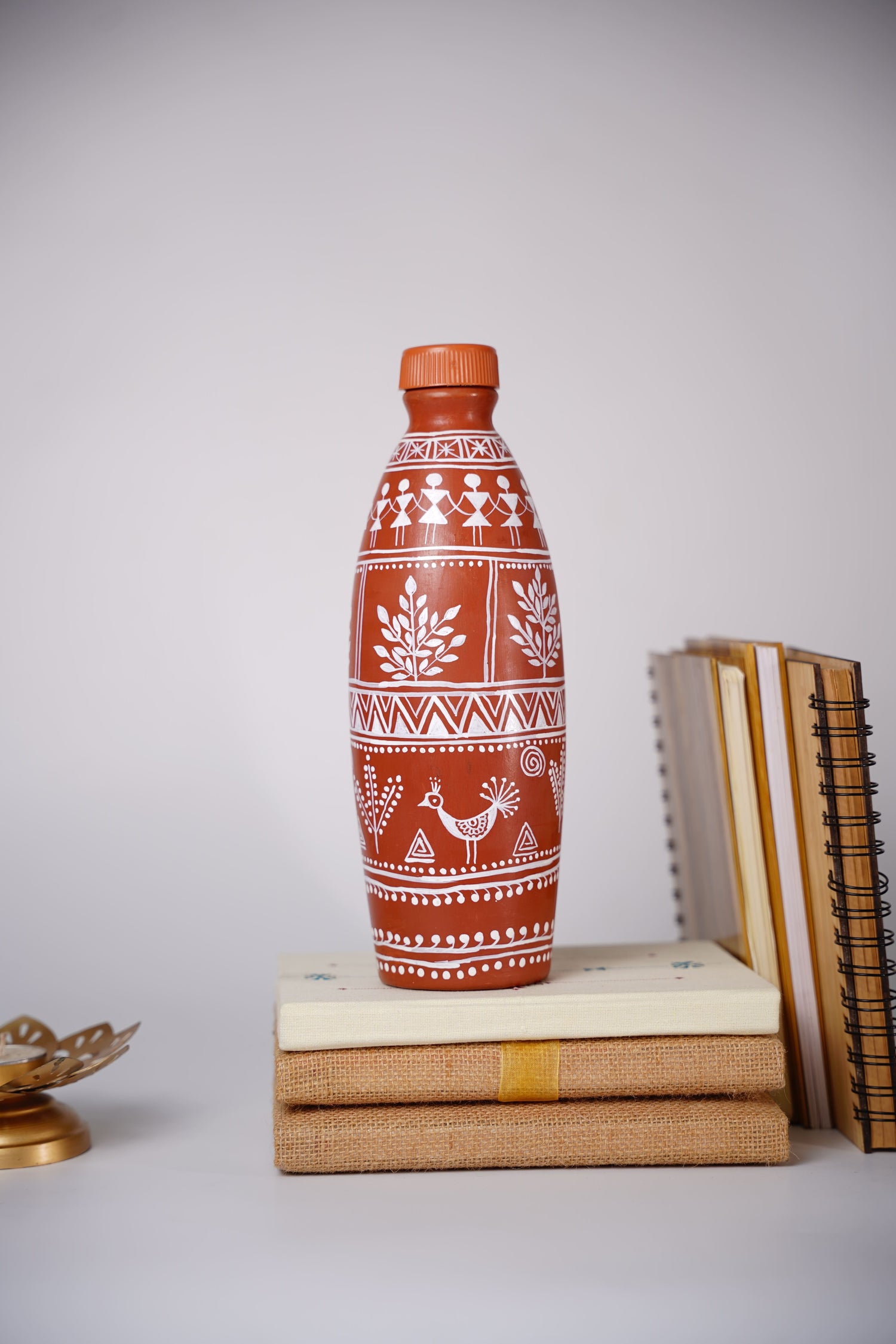 Bottle handmade clay water bottle with Warli art