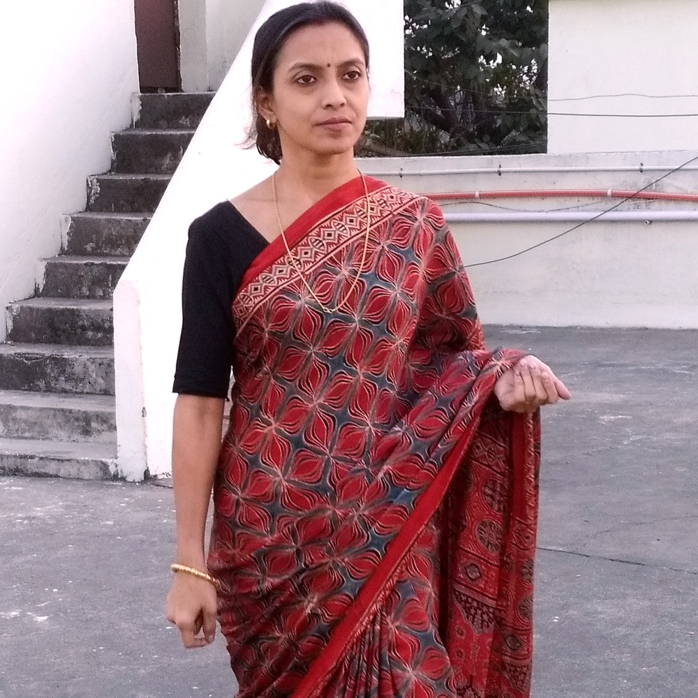 Exclusively Hand Block printed Natural Dyed Ajrakh Modal silk saree.