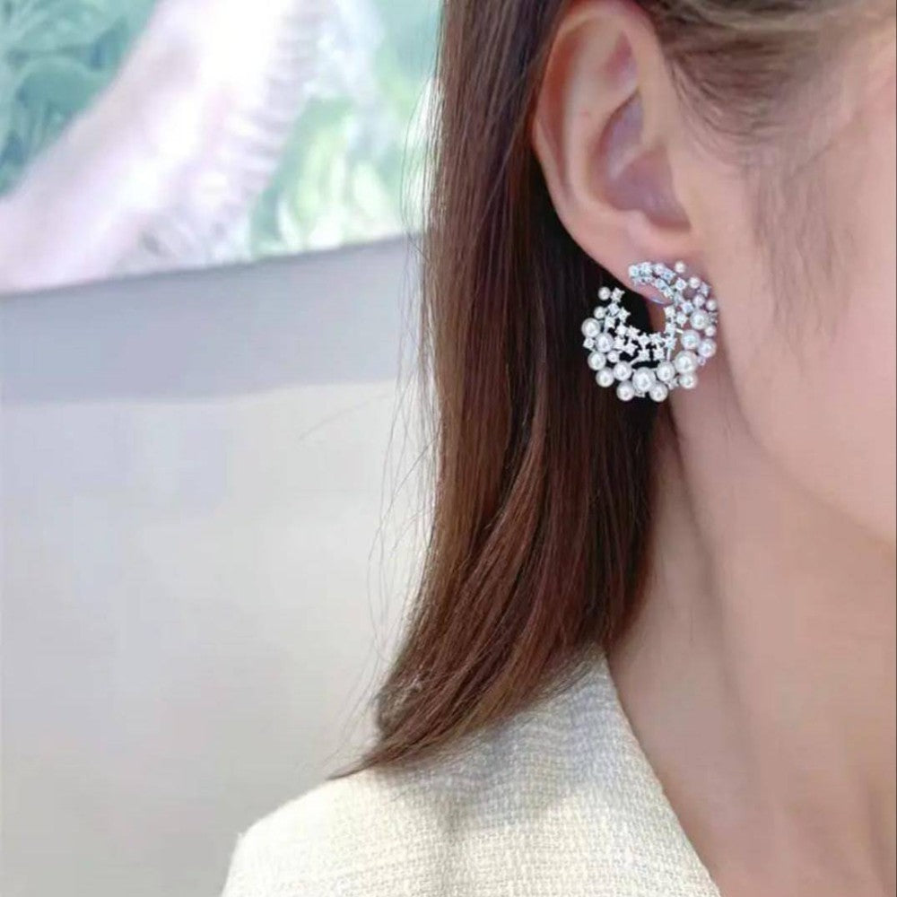 Pearl and diamond earrings
