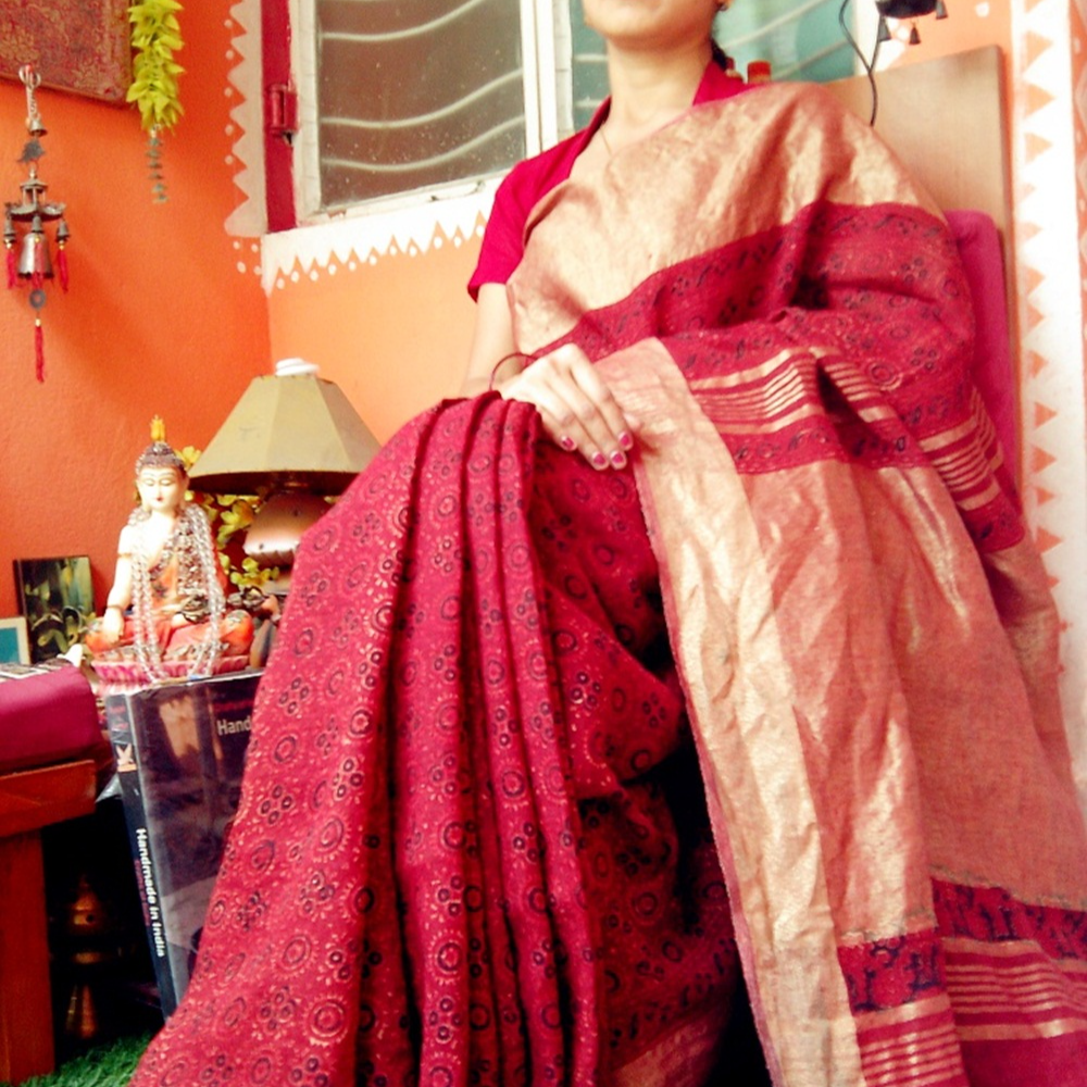 Pure Linen Saree with Ajrakh Hand Block Print..Zari Border Signature Work Saree